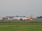 a large airplane on the runway
