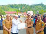 bupati-hendrajoni-terima-dua-penghargaan-kemenag-ri-atas-dukungan-dan-inovasi-pelayanan-haji