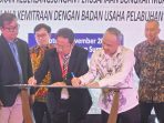 dukung-kelancaran-barang-dan-logistik,-ketua-apbmi-sumbar-hm-tauhid-teken-mou-dengan-pelindo-regional-2-teluk-bayur