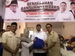 andre-rosiade-bagikan-ribuan-paket-sembako-di-kabupaten-limapuluh-kota