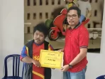 maxim-salurkan-santunan-pengobatan-untuk-mitra-pengemudi-padang
