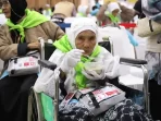 kloter-pdg-07-antar-24-jemaah-disabilitas-ke-masjidil-haram