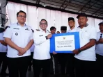 pemkab-tanah-datar-salurkan-bantuan-dana-bagi-korban-bencana-2025