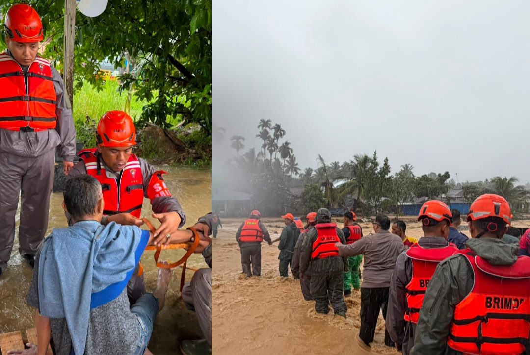 tim-sar-satbrimob-polda-sumbar-evakuasi-korban-banjir-di-kota-padang tim-sar-satbrimob-polda-sumbar-evakuasi-korban-banjir-di-kota-padang